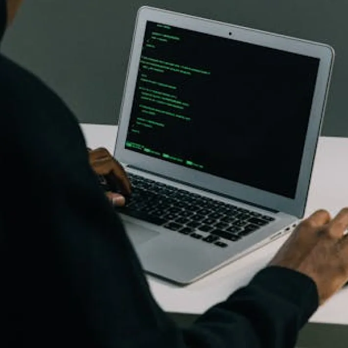 Laptop with code on screen